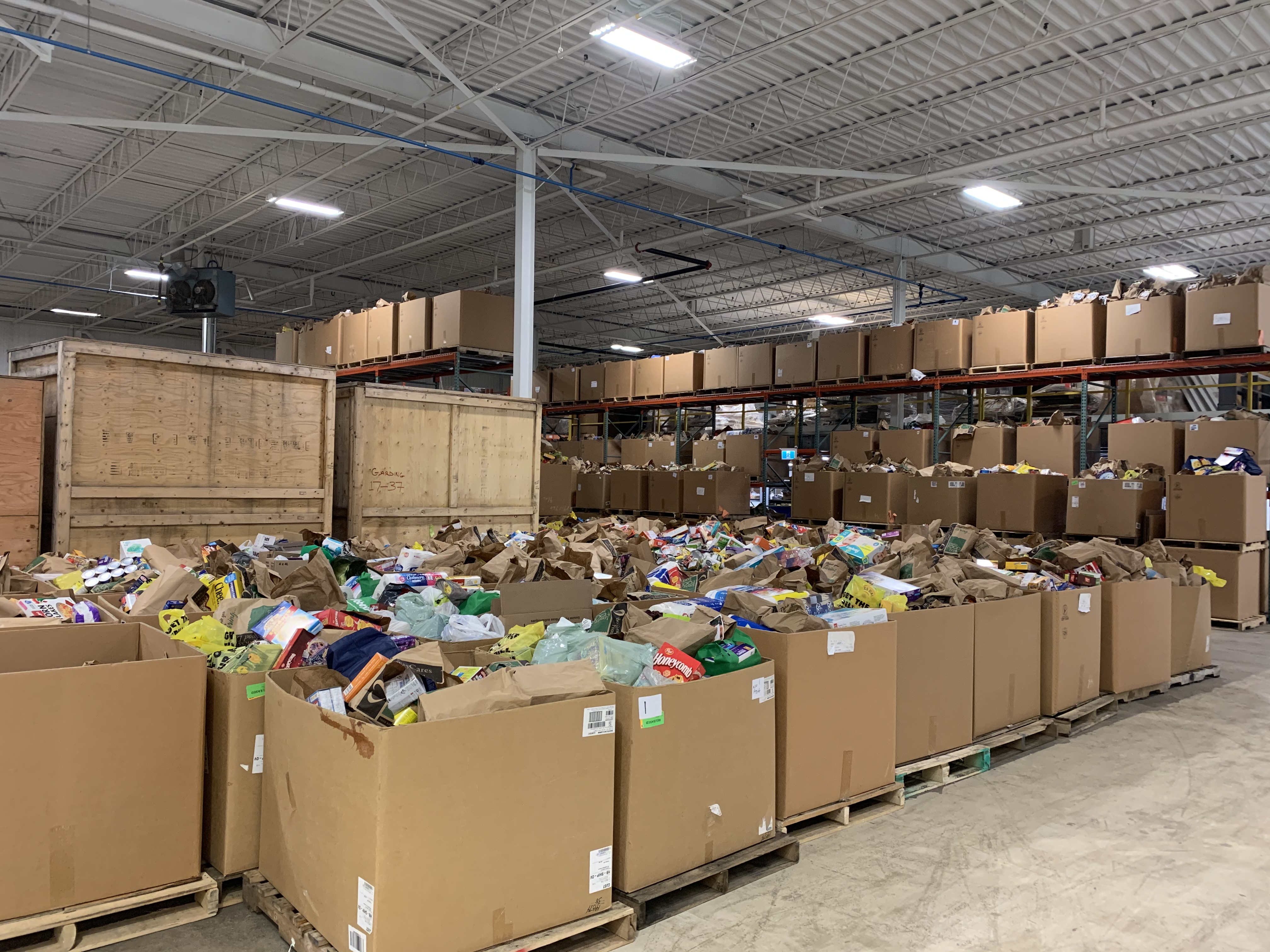Groceries collected during the Grocery Store Weekend housed in the JMP Solutions warehouse.